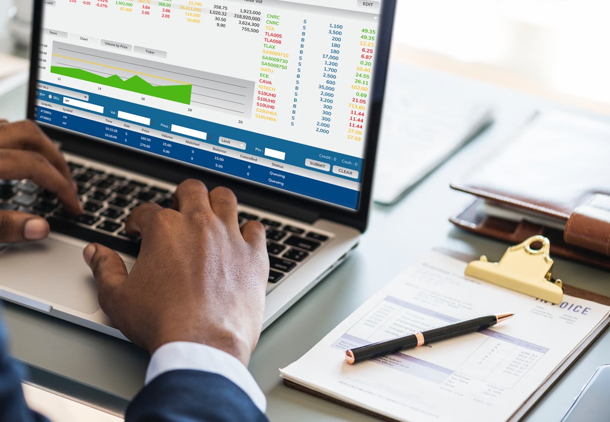 A man reviewing financial reports